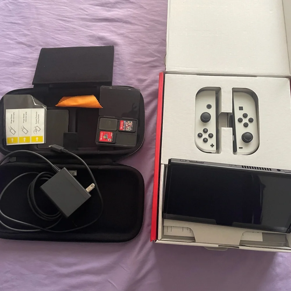 Nintendo Switch with Gray Joy-Con and Accessories